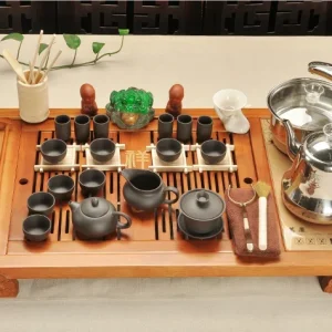 Bộ Bàn Trà Điện Thông Minh Gỗ Tự Nhiên Chạm Khắc Tường Vân Kèm Trọn Bộ Ấm Chén Trà Đạo Cao Cấp