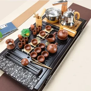 Bộ Bàn Trà Đạo Điện Thông Minh Chạm Khắc Tường Vân Đen Tuyền Kèm Trọn Bộ Ấm Chén Tử Sa Cổ Điển