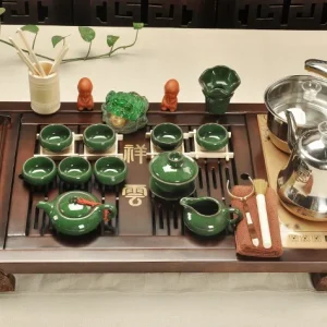 Bộ Bàn Trà Đạo Điện Thông Minh Gỗ Tự Nhiên Chạm Khắc Kèm Ấm Chén Sứ Men Xanh Lục Bảo