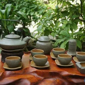Bộ Ấm Chén Gốm Sứ Men Mộc Lòng Vàng Quai Xách Đồng